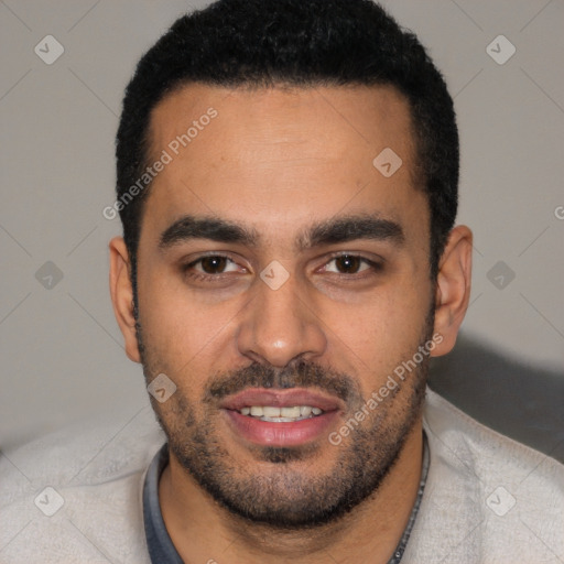 Joyful white young-adult male with short  black hair and brown eyes