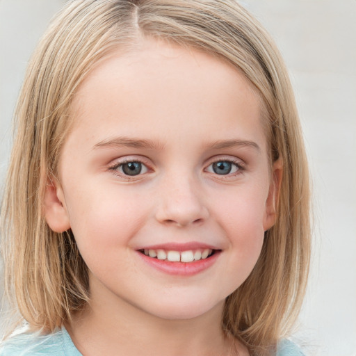 Joyful white child female with medium  brown hair and blue eyes