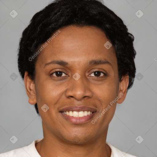 Joyful latino young-adult female with short  black hair and brown eyes