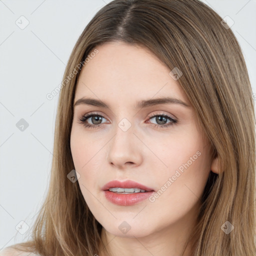 Neutral white young-adult female with long  brown hair and brown eyes