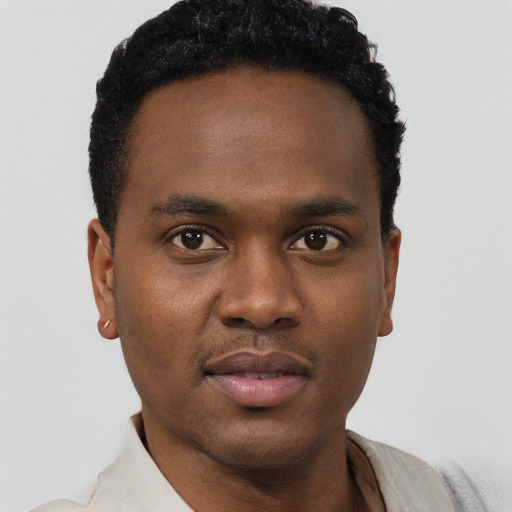 Neutral black young-adult male with short  black hair and brown eyes