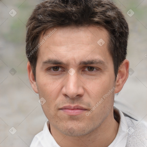 Joyful white adult male with short  brown hair and brown eyes