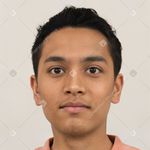 Neutral latino young-adult male with short  black hair and brown eyes