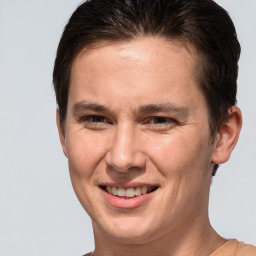 Joyful white adult male with short  brown hair and brown eyes