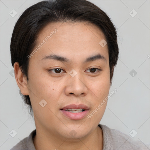 Joyful asian young-adult male with short  brown hair and brown eyes