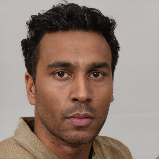 Neutral latino young-adult male with short  brown hair and brown eyes