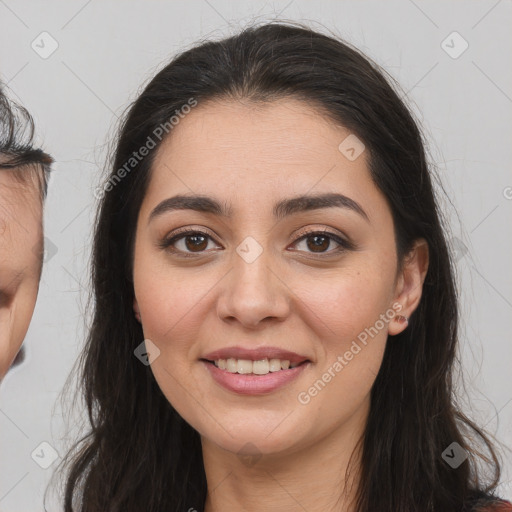 Joyful white young-adult female with long  brown hair and brown eyes