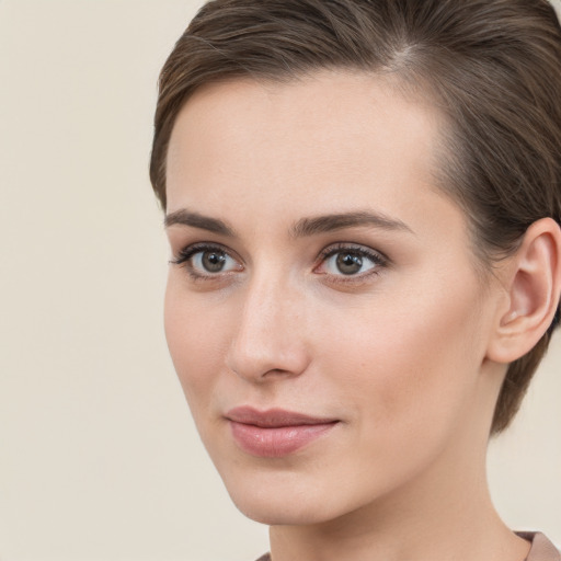 Neutral white young-adult female with medium  brown hair and brown eyes