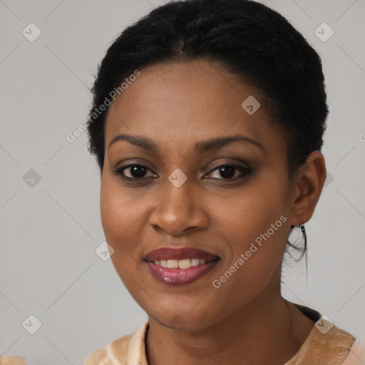 Joyful black young-adult female with medium  black hair and brown eyes