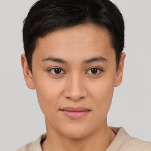 Joyful white young-adult female with short  brown hair and brown eyes