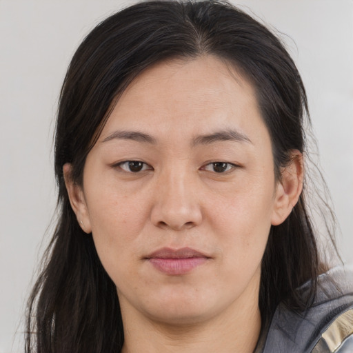 Neutral asian young-adult female with long  brown hair and brown eyes