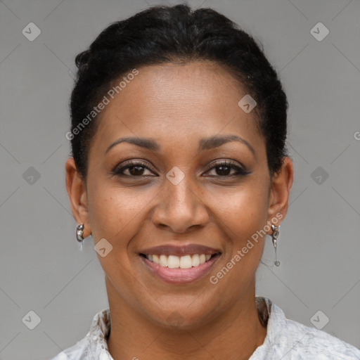 Joyful latino young-adult female with short  brown hair and brown eyes