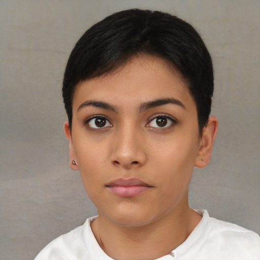 Neutral latino young-adult female with short  black hair and brown eyes