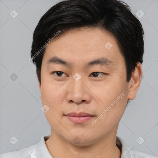 Neutral asian young-adult male with short  brown hair and brown eyes