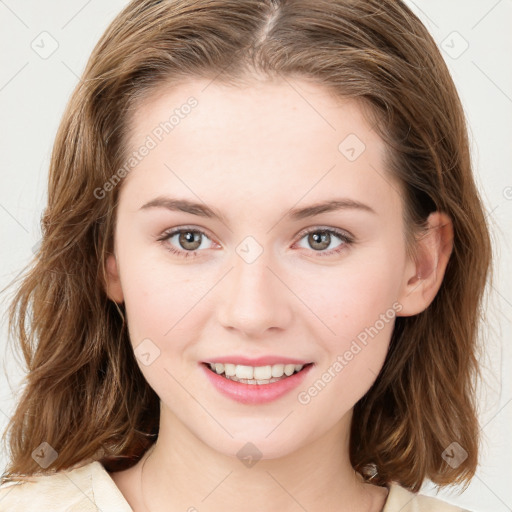 Joyful white young-adult female with medium  brown hair and green eyes