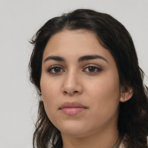 Neutral latino young-adult female with long  black hair and brown eyes
