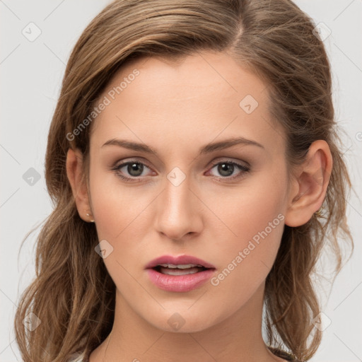 Joyful white young-adult female with long  brown hair and grey eyes