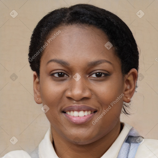 Joyful latino young-adult female with short  brown hair and brown eyes