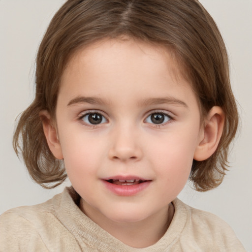 Joyful white child female with medium  brown hair and brown eyes