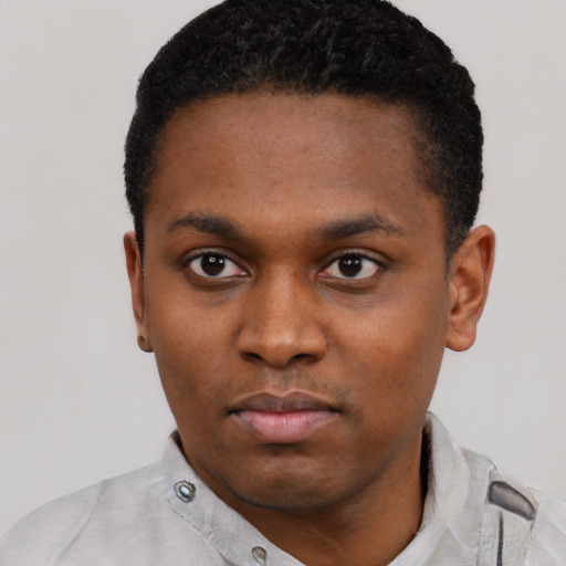 Neutral black young-adult male with short  black hair and brown eyes