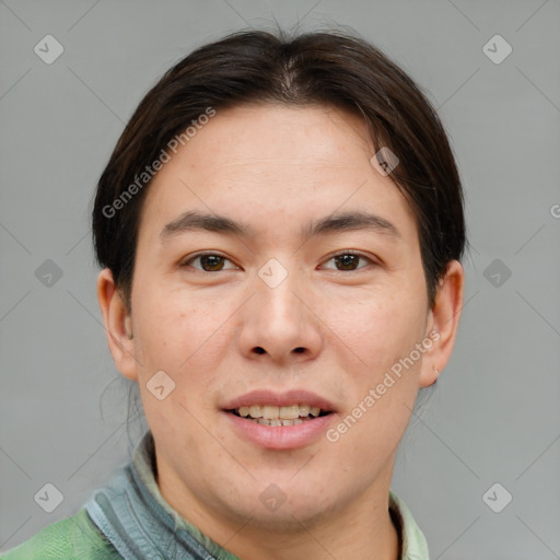 Joyful asian young-adult male with short  brown hair and brown eyes