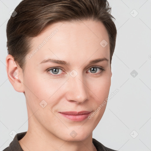 Joyful white young-adult female with short  brown hair and grey eyes