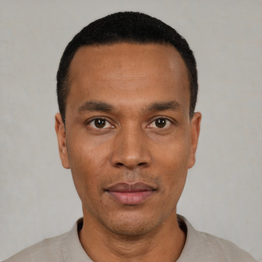 Neutral black young-adult male with short  black hair and brown eyes
