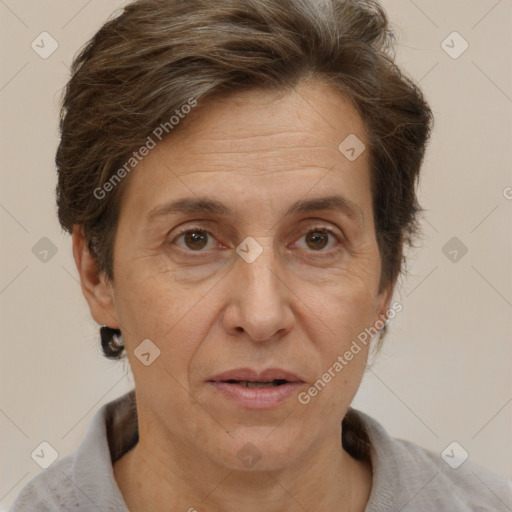 Joyful white adult female with short  brown hair and brown eyes