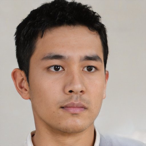 Neutral asian young-adult male with short  brown hair and brown eyes