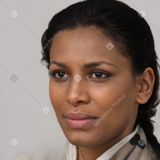 Neutral black young-adult female with medium  black hair and brown eyes