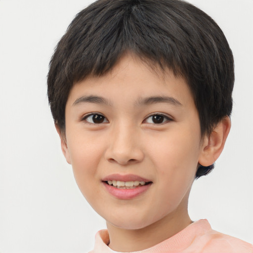 Joyful asian child female with short  brown hair and brown eyes