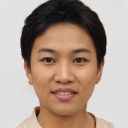 Joyful asian young-adult female with short  brown hair and brown eyes