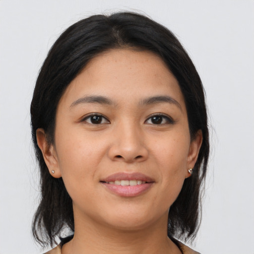 Joyful asian young-adult female with medium  brown hair and brown eyes