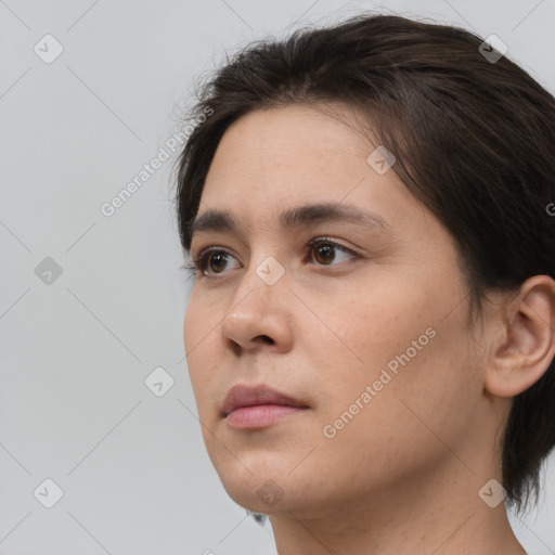 Neutral white young-adult female with medium  brown hair and brown eyes