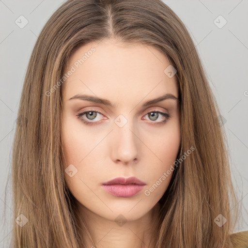 Neutral white young-adult female with long  brown hair and brown eyes