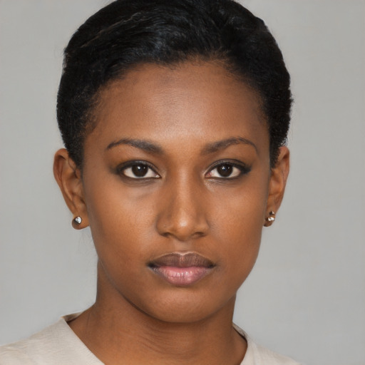 Neutral black young-adult female with short  black hair and brown eyes
