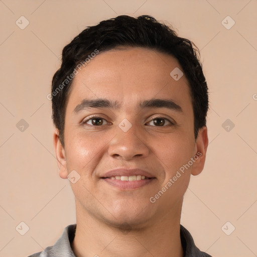 Joyful white young-adult male with short  black hair and brown eyes