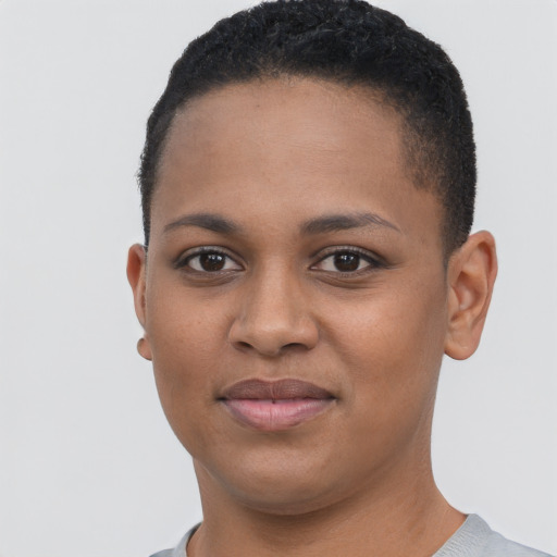 Joyful black young-adult female with short  brown hair and brown eyes