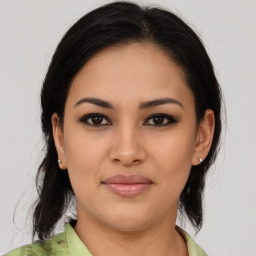 Joyful asian young-adult female with medium  brown hair and brown eyes