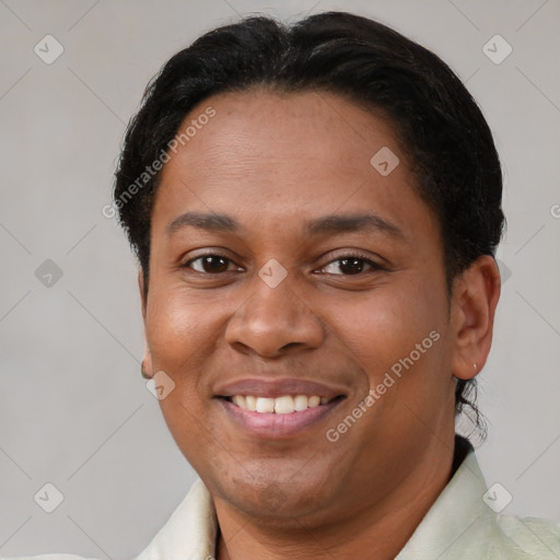 Joyful latino young-adult female with short  brown hair and brown eyes