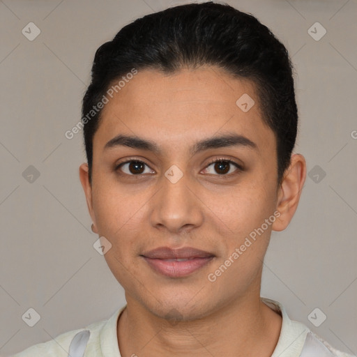 Joyful latino young-adult female with short  black hair and brown eyes