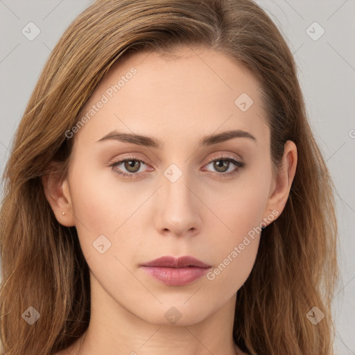 Neutral white young-adult female with long  brown hair and brown eyes