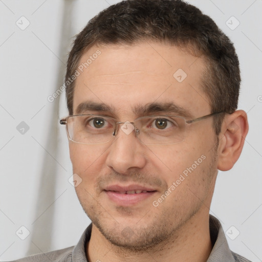 Joyful white adult male with short  brown hair and brown eyes