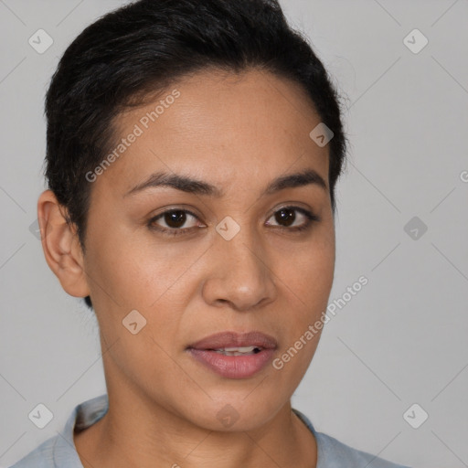 Joyful latino young-adult female with short  brown hair and brown eyes