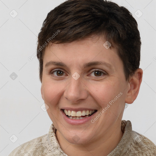 Joyful white young-adult female with short  brown hair and brown eyes