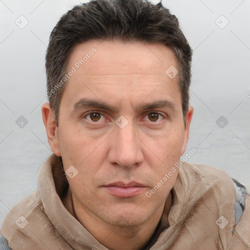 Neutral white adult male with short  brown hair and brown eyes