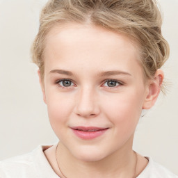 Joyful white child female with medium  brown hair and grey eyes