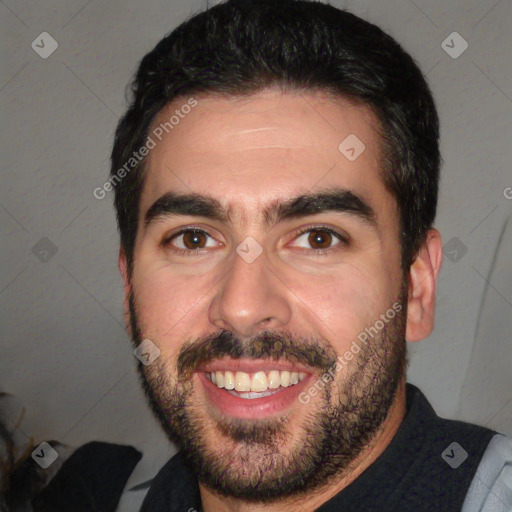 Joyful white young-adult male with short  black hair and brown eyes