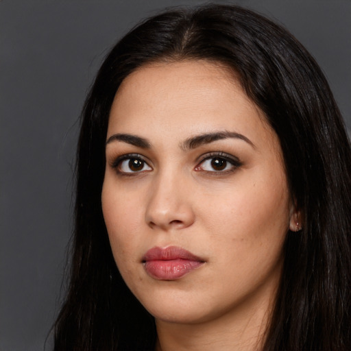 Neutral white young-adult female with long  black hair and brown eyes