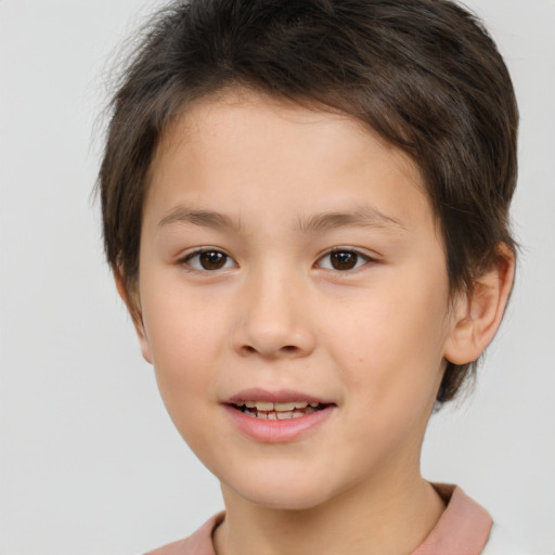 Joyful white child female with short  brown hair and brown eyes